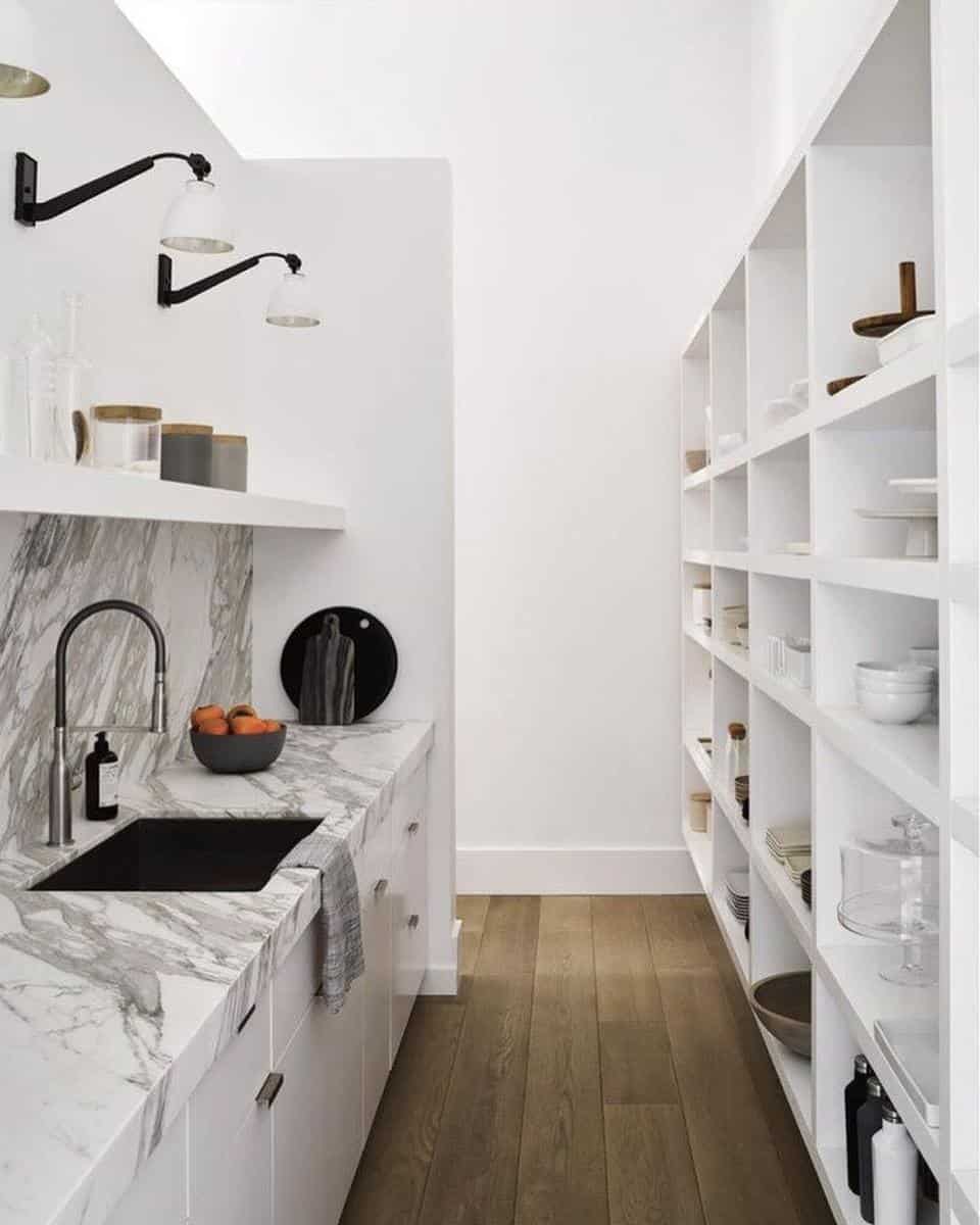 marble sink butler's pantry white shelving unit