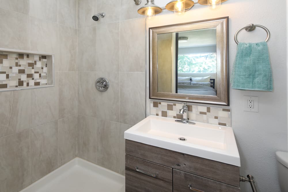 gray tile small master bathroom 