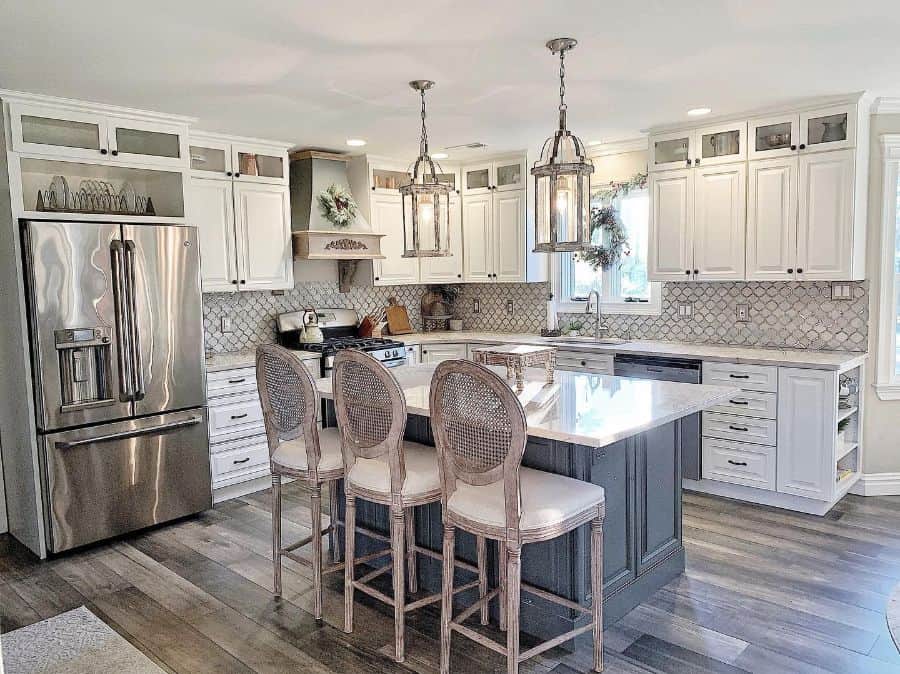 rustic white kitchen with wood vinyl flooring and large fridge 