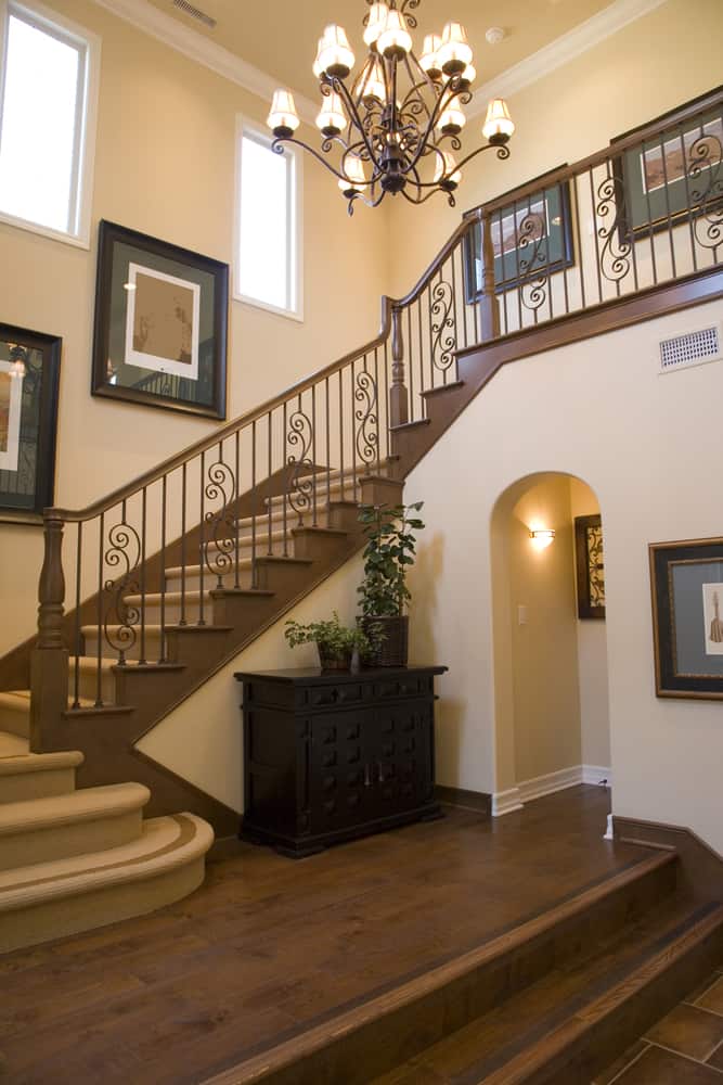 elegant staircase with ornate railings 