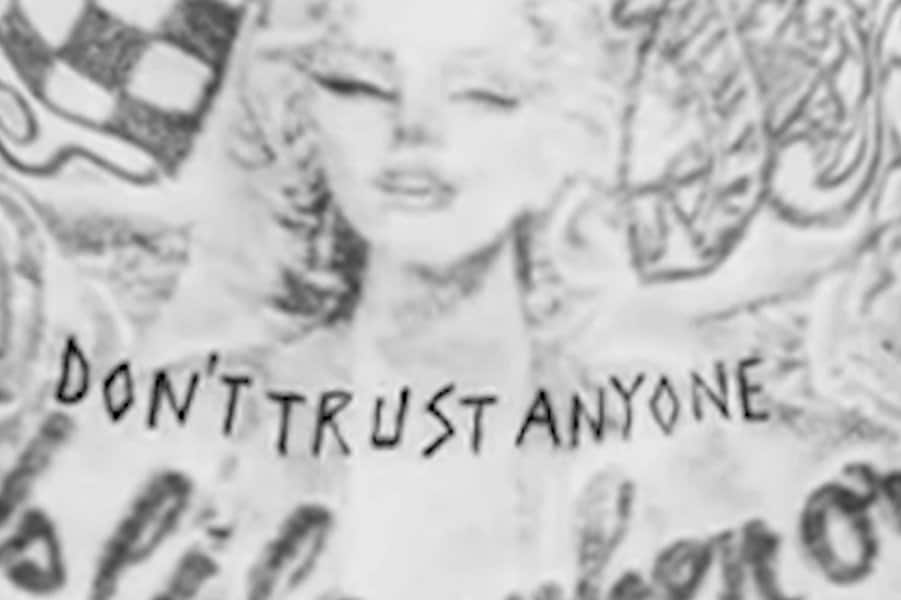 "Don't Trust Anyone" tattoo