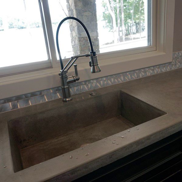 Unique Metal Backsplash Designs With Concrete Countertops And Sink