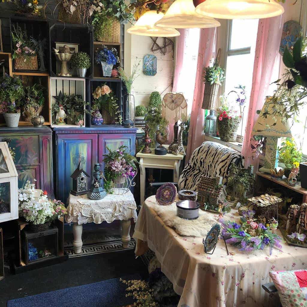 Vintage sunroom filled with colorful cabinets, floral decor, and eclectic accents.