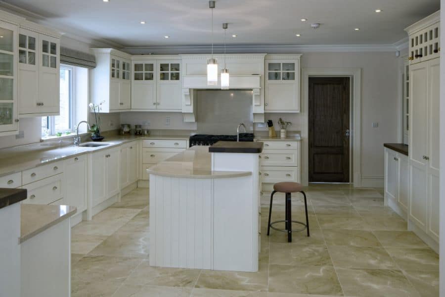 large modern kitchen with white cabinets 