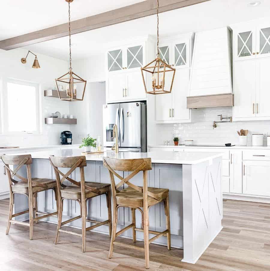 large farmhouse kitchen with white cabinets and island 