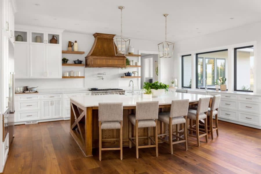 large white cabinet kitchen with wood accents 