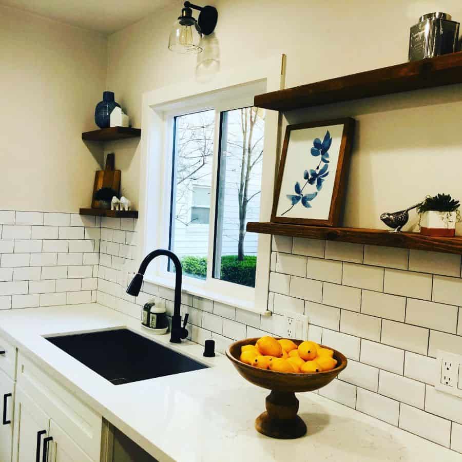 small kitchen wood floating shelves white tile backsplash 