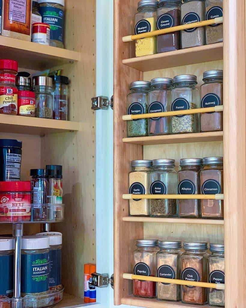 small wooden pantry with spice racks